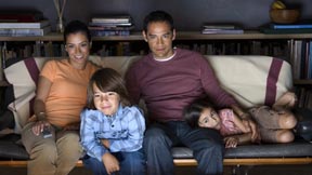 A family watching a movie together.