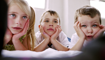 Father and son at computer