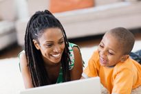 Mom and boy on a computer