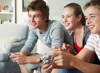 Teens playing video games