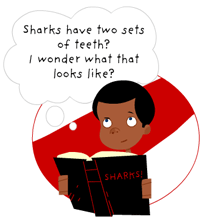Boy reading book about sharks